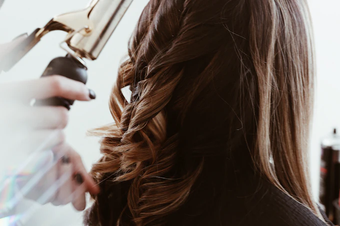 Balayage californien sur cheveux longs ondulés